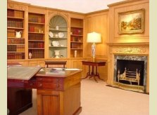 Georgian style panelled study with bookcases and display cabinets